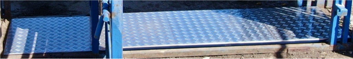 Lightweight aluminium weighing platform fitted inside a cattle crush